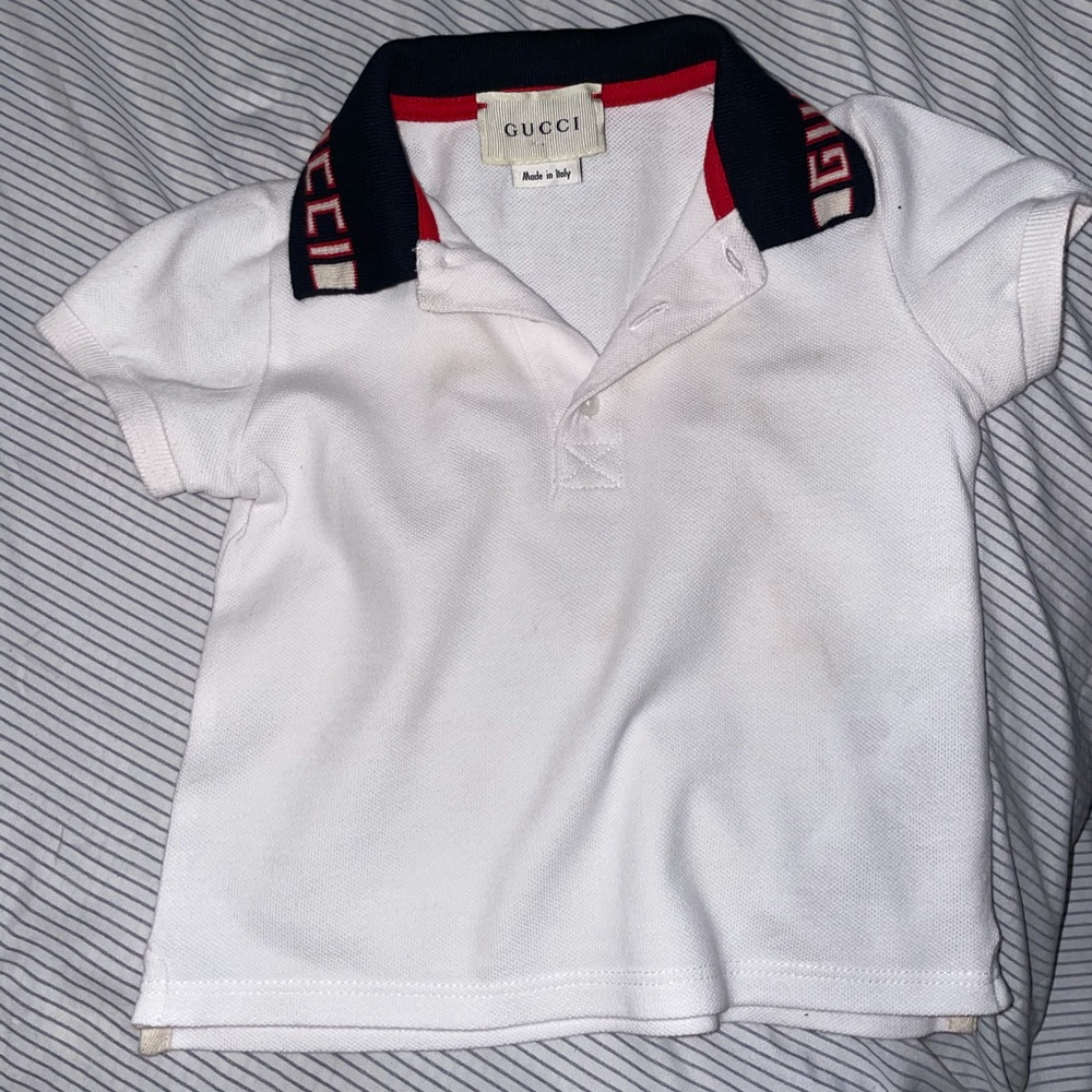 A baby boy authentic Gucci polo shirt